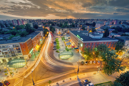Galati, ROMANIA - July 19, 2021: Aerial view of Galati City, Romania. Night city lights after sunset at blue hourのeditorial素材
