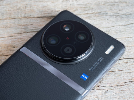 Galati, Romania - March 10, 2023: Recently launched vivo X90 Pro smartphone with triple 1 inch cameraa on the back with laser focus. Vivo brand on the backのeditorial素材