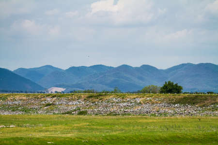 Small hill behind the dam in Thailandの写真素材