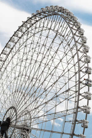 Low-angle view of a huge ferris wheelの写真素材