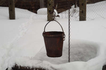 The well water under snow.の写真素材