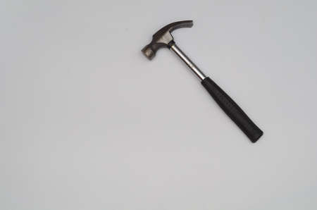 small claw hammer with metal handle isolated view, white background