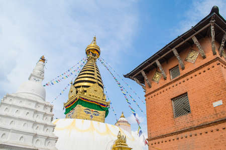 the famous buuha eye gazing out sleepily from each side of the tower are those of the all seeing primordial buddha.perched a top a hill on the western edge of the kathmandu valley.のeditorial素材