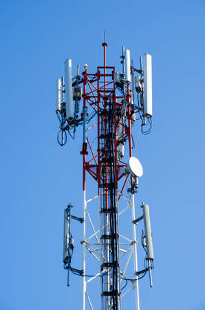 blue sky have cloud in winter season and have Antenna is foreground.