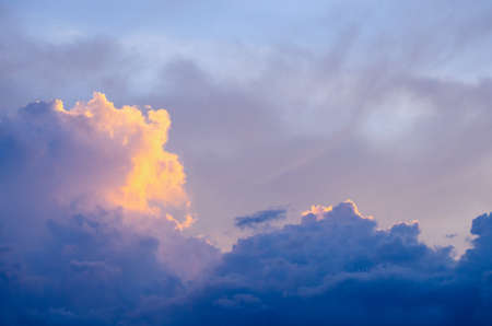before sunrise . the sky have many color such as res orange blue yellow and purple .it is beautiful background.の写真素材