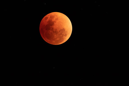 In the night time. the moon have red colour and full phaseの写真素材