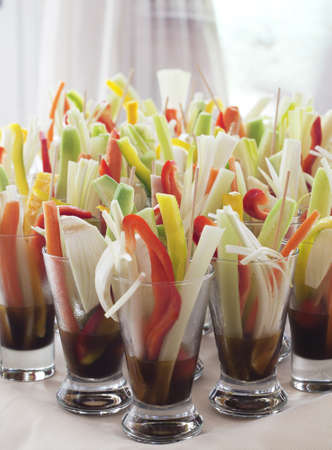 Cutted vegetables in glassesの写真素材