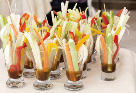 Cutted vegetables in glassesの写真素材