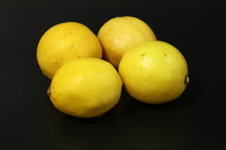 lemons on black backgroundの写真素材