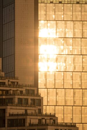 golden reflection on glass facadeの写真素材