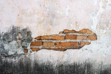 Brick,concrete weathered grunge wall backgroundの写真素材