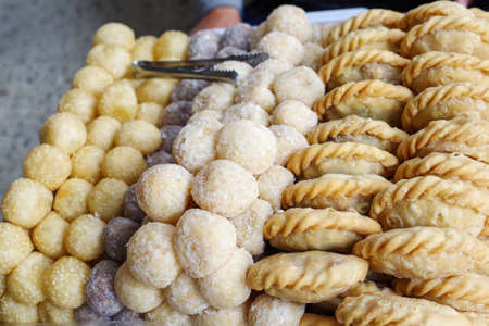 Deep fried dessert balls and curry puff, Thai style desserts in local marketの写真素材