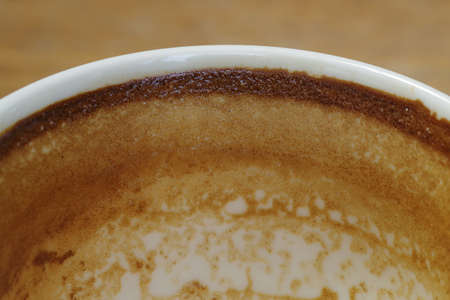 Coffee stain on white coffee cup, abstract coffee backgroundの写真素材