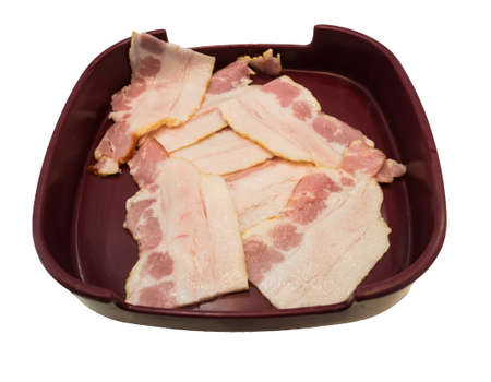 bacon in  brown trayの写真素材