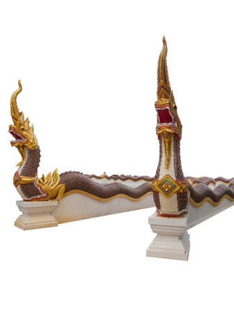 Naga statue protecting the entrance to Thai templeの写真素材