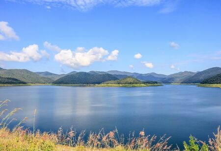 Inland lakes and mountains in the bright sky.の写真素材