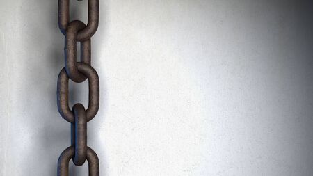 A rusty metal link chain hanging over a bright texturedの写真素材