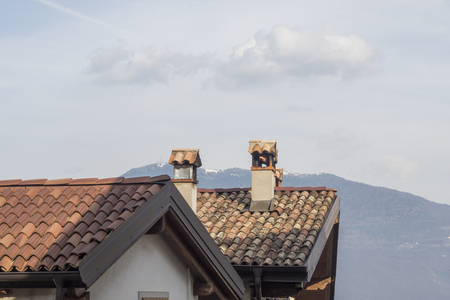 roof and chimney and cloudsの写真素材