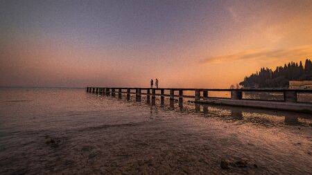 sirmione beach by snight and sunsetの写真素材