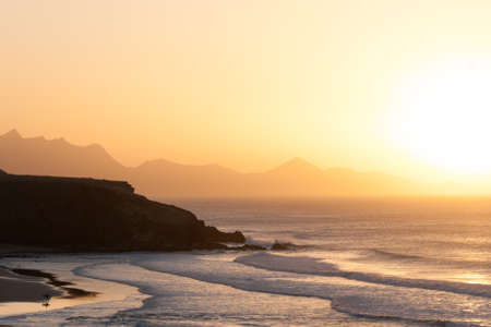 Surf at sunsetの写真素材