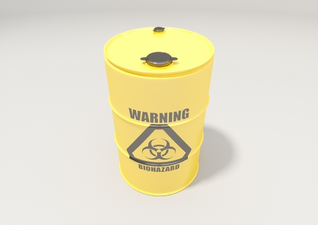 Yellow metal barrels with black biohazard warning sign isolated on white backgroundの写真素材
