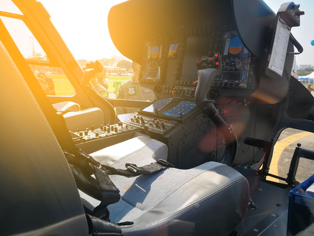 Helicopter cockpit with control panels