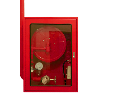 Fire water hoses and fire extinguisher equipment in red cabinet isolate on white background.の写真素材