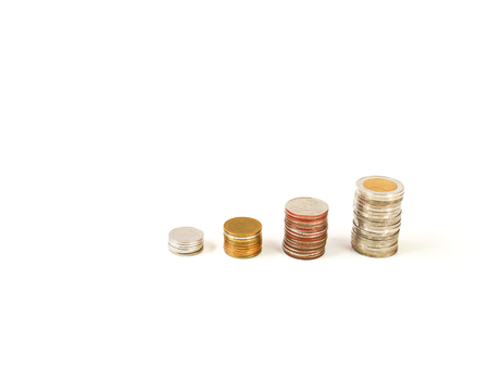 Selective focus saving stack coins isolated on white background with copy space, Business and financial concept.の写真素材