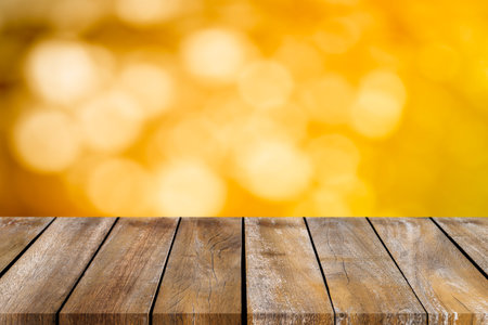 Empty of wooden table top with bokeh background. For montage product display or design key visual layouts.の写真素材