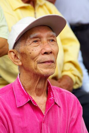 The Old Chinese Audience in red who watching an Activityの写真素材