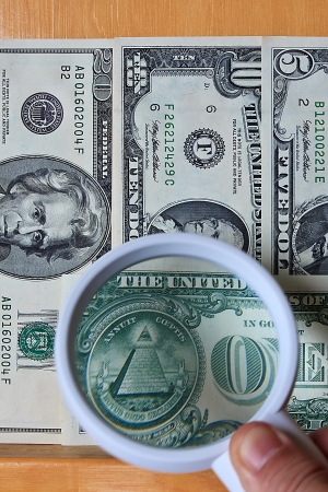 A View of U S  dollars with Magnifierの写真素材