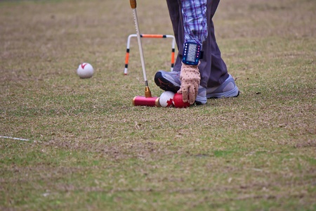 The Interesting Practice Posture of Croquet sportの写真素材
