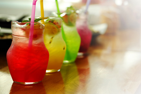 colorful cold Italian soda   syrup Serve in jar with garden restaurant background