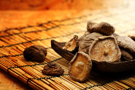 Dried Shiitake Mushroom on mat earth tone backgroundの写真素材