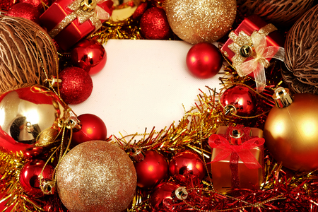 Christmas items in red and gold theme with white frame for write word to merry Christmas and Happy New Yearの写真素材