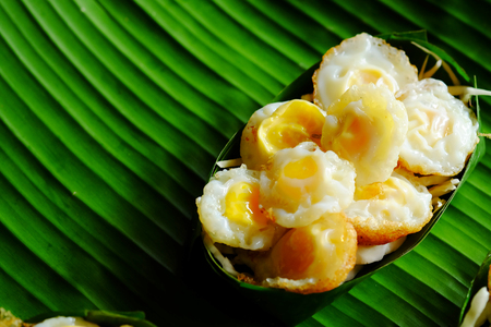 "Kai krok"Quail Egg mortar Served in Krathong made from banana leaves. Thailand tradition food in market steedの写真素材