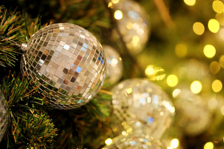 close up mirror ball or Christmas ball to decorative for Christmas festival with bokeh background. Have some space for write wordingの写真素材