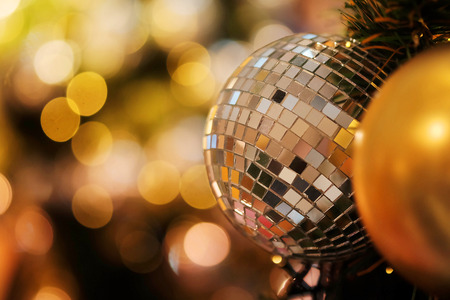 Decorative with mirror ball or Christmas ball for merry Christmas and happy new years festival with bokeh background. Have some space for write wordingの写真素材