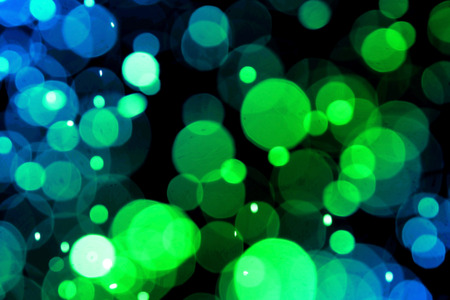 colorful circles bokeh effect of light abstract background with nightlifeの写真素材