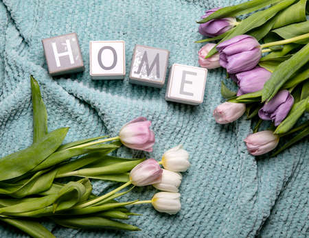 Scarf, and flowers on a white background.Home decor Flat lay, top view. stay at homeの写真素材