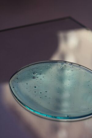 Blue and white hyaluronic acid gel in the form of a circle with oxygen bubbles