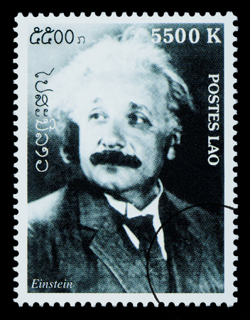 LAOS - CIRCA 1999: A postage stamp printed in Laos showing Albert Einstein, circa 1999のeditorial素材