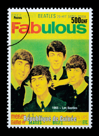 REPUBLIC OF GUINEA - CIRCA 2001: A postage stamp printed in Guinea showing  The Beatles, circa 2001のeditorial素材