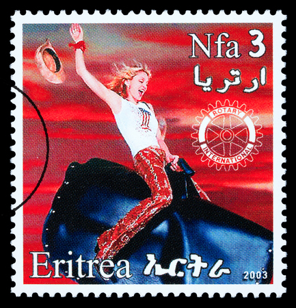 ERITREA - CIRCA 2003: A postage stamp printed in Eritrea showing Madonna Louise Ciccone, circa 2003のeditorial素材