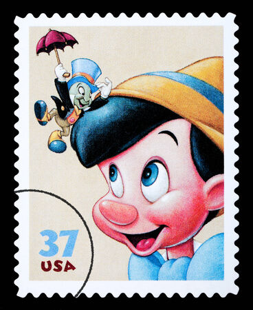 UNITED STATES AMERICA - CIRCA 2004: A postage stamp printed in the USA showing the Disney character Pinocchio, circa 2004のeditorial素材