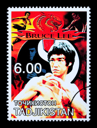 TADJIKISTAN - CIRCA 2000: A postage stamp printed in Tadjikistan showing Bruce Lee, circa 2000のeditorial素材