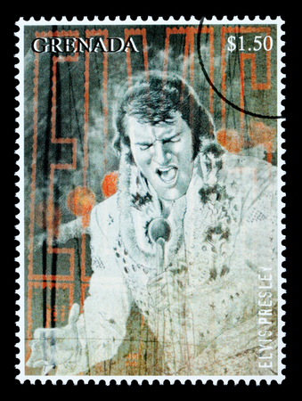GRENADA - CIRCA 2000: A postage stamp printed in Grenada showing Elvis Presley, circa 2000のeditorial素材