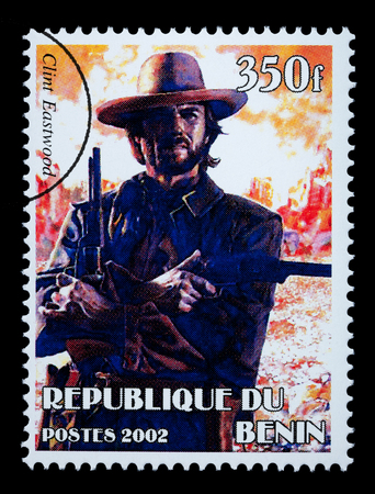 REPUBLIC OF BENIN - CIRCA 2002: A postage stamp printed in the Republic of Benin showing Clint Eastwood, circa 2002のeditorial素材