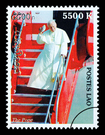LAOS - CIRCA 1999: A postage stamp printed in Laos showing Pope John Paul II, circa 1999のeditorial素材