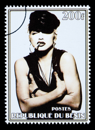 REPUBLIC OF BENIN - CIRCA 2002: A postage stamp printed in the Republic of Benin showing Madonna Louise Ciccone, circa 2002のeditorial素材
